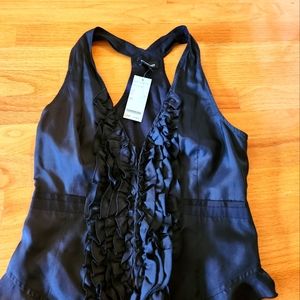 Bebe sexy racer back vest with ruffle front and corset button down. Tuxedo look.